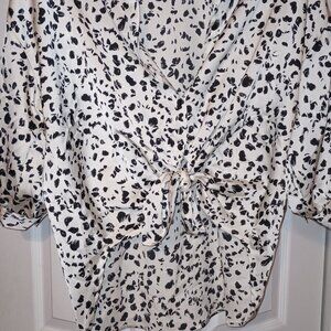 Cute tie front or button down top.